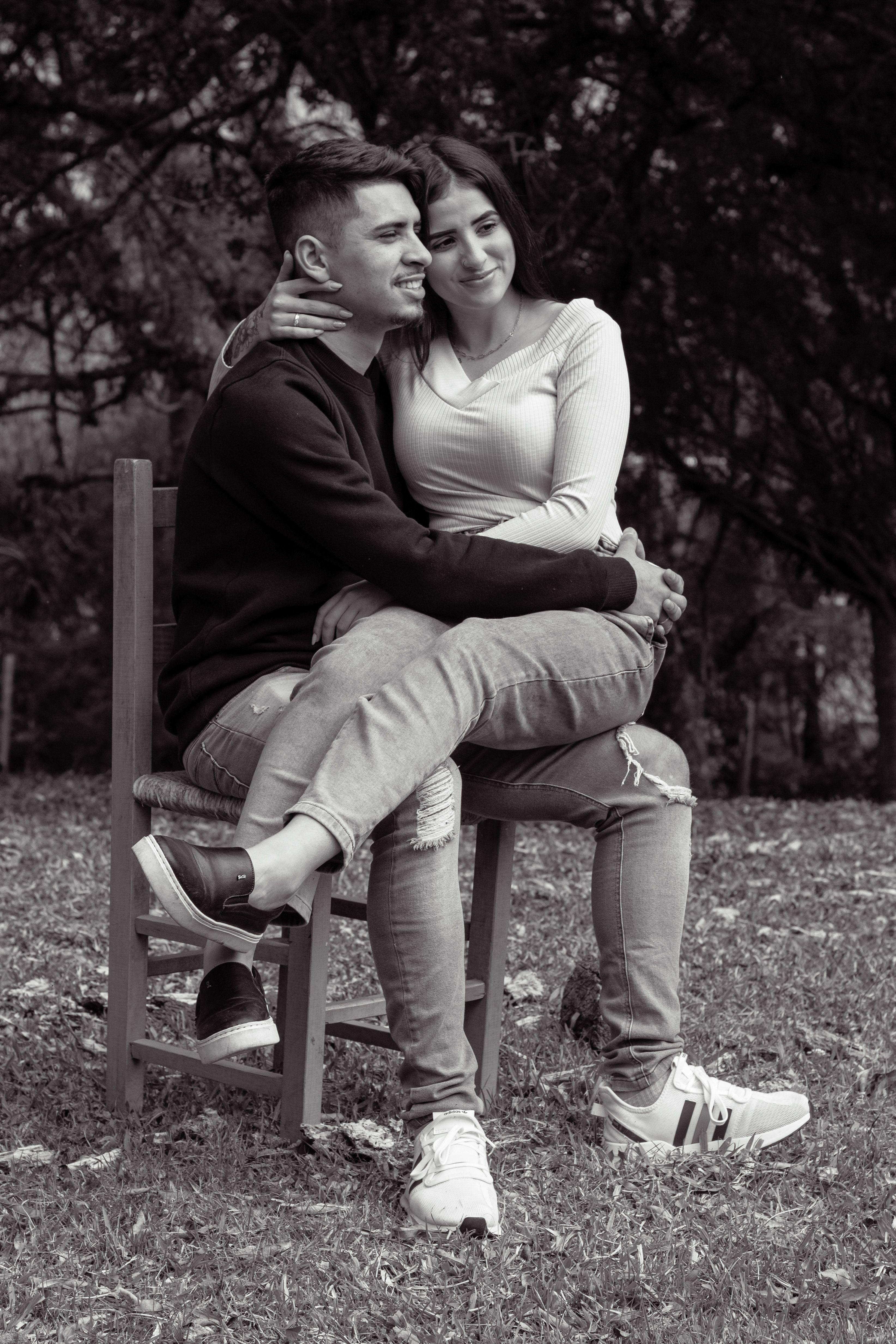 Couple Sitting and Hugging · Free Stock Photo