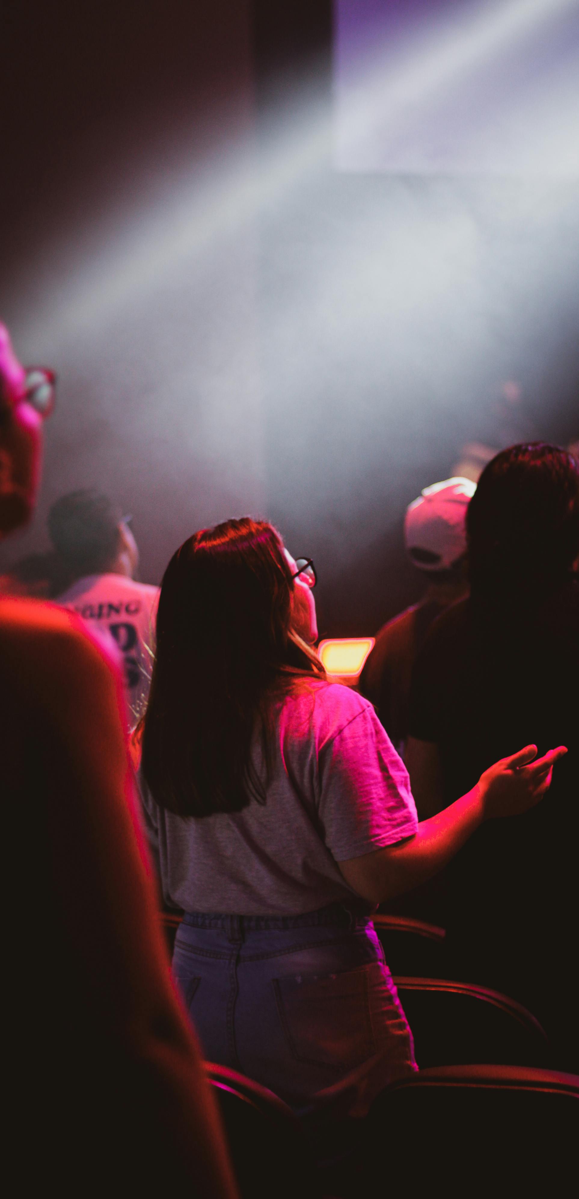 light over woman at gathering