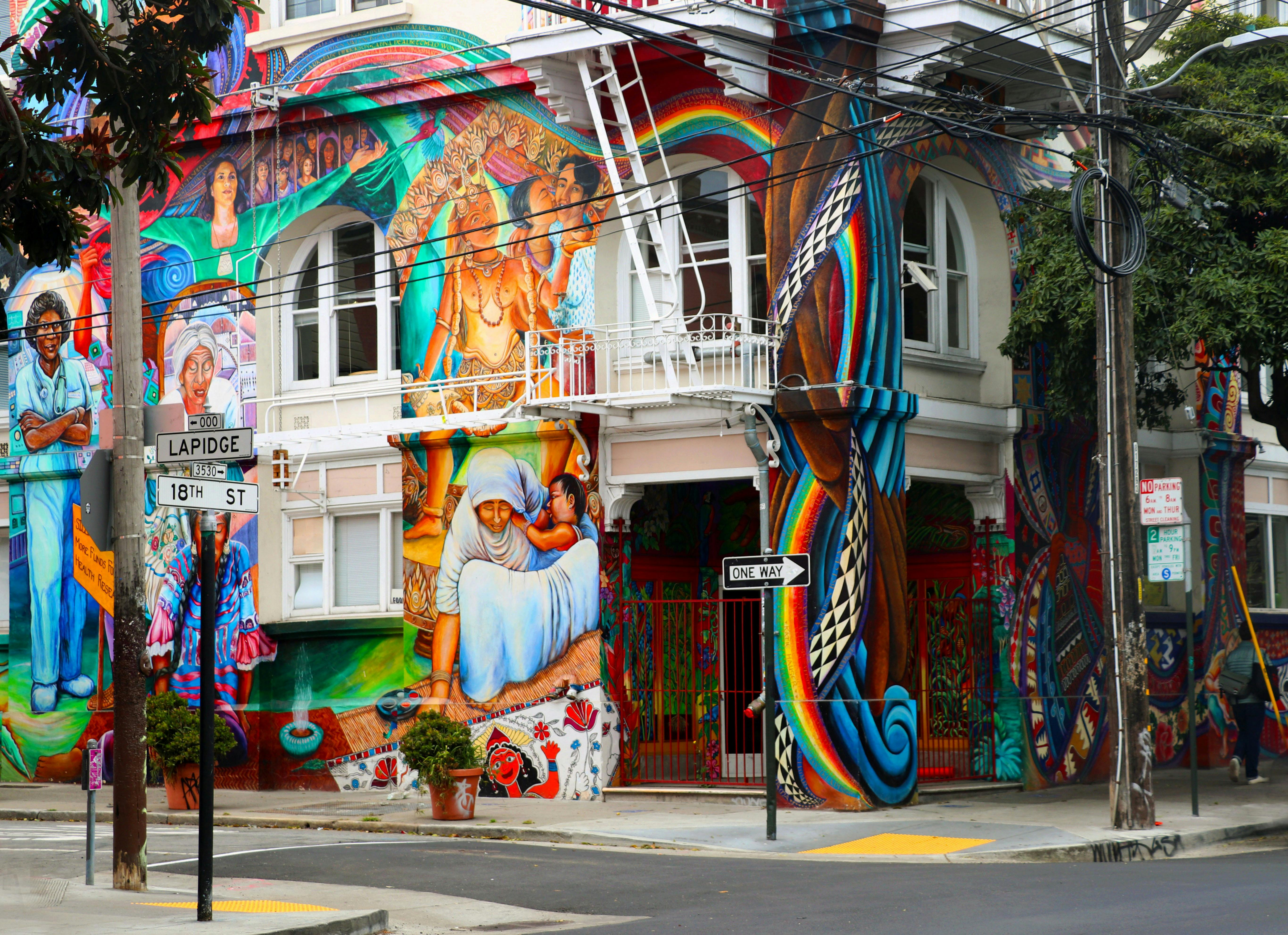 Colorful murals adorn the iconic Women's Building in San Francisco's Mission District, exemplifying urban creativity.