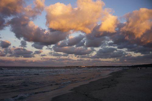 Free Stunning coastal view with dramatic clouds at sunset, highlighting nature's beauty. Stock Photo