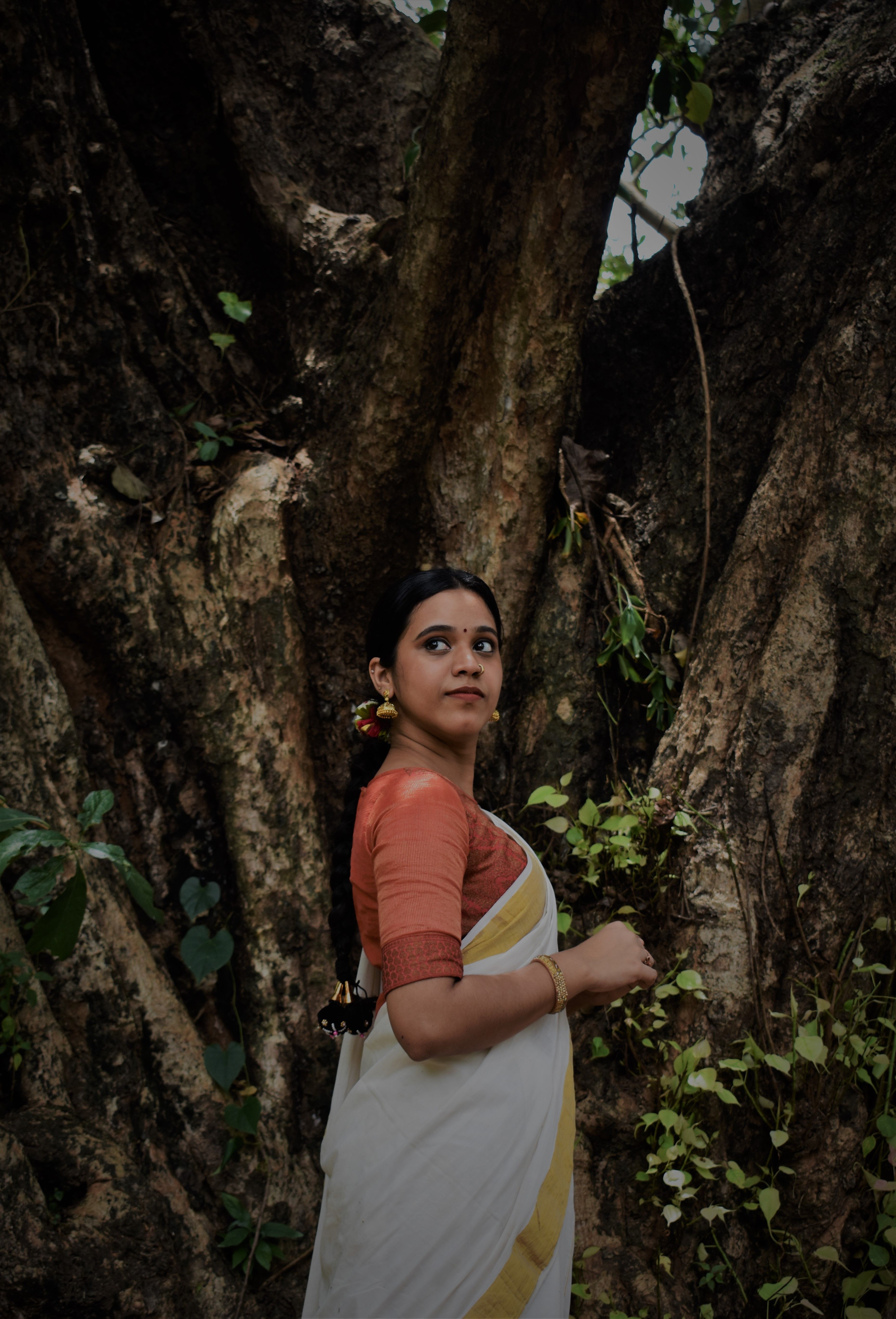 Woman Standing by the Tree · Free Stock Photo