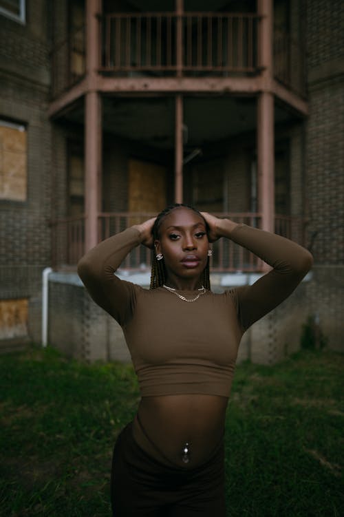 Young Woman in a Trendy Outfit Posing Outside 