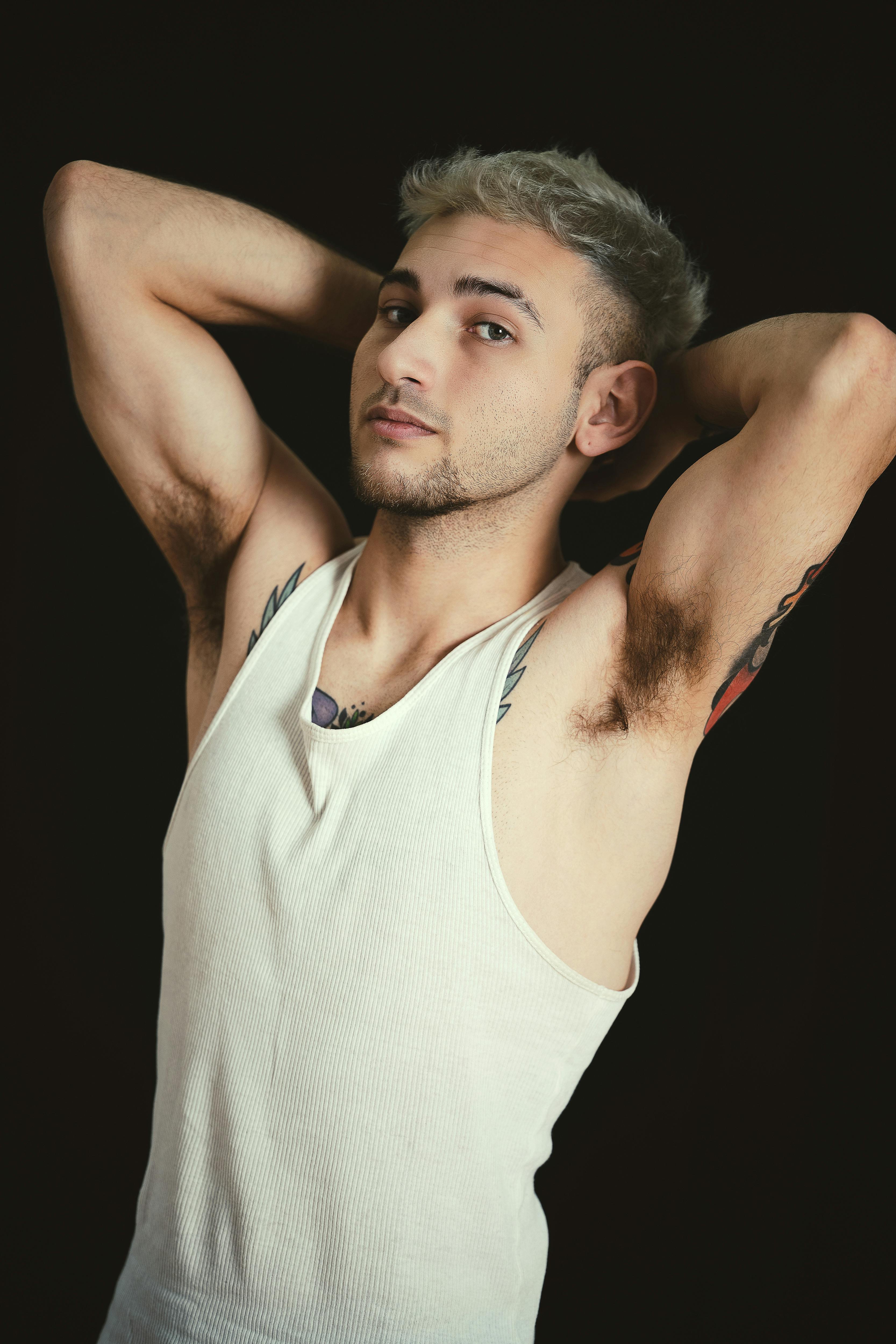 Young Blonde Man Posing in a White Top · Free Stock Photo