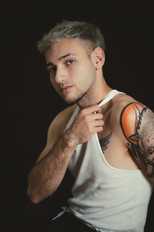 Studio Shot of a Young Man with Tattoos