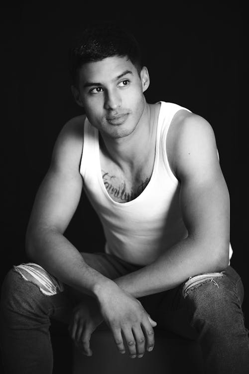 Studio Shot of a Young Man Wearing a Tank Top 