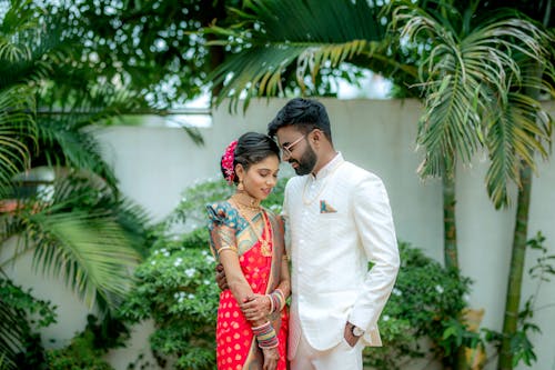 Newlyweds Standing in Traditional Clothing