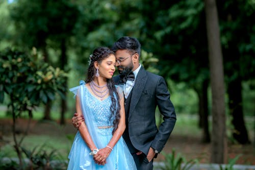 Couple in Blue Dress and Tuxedo