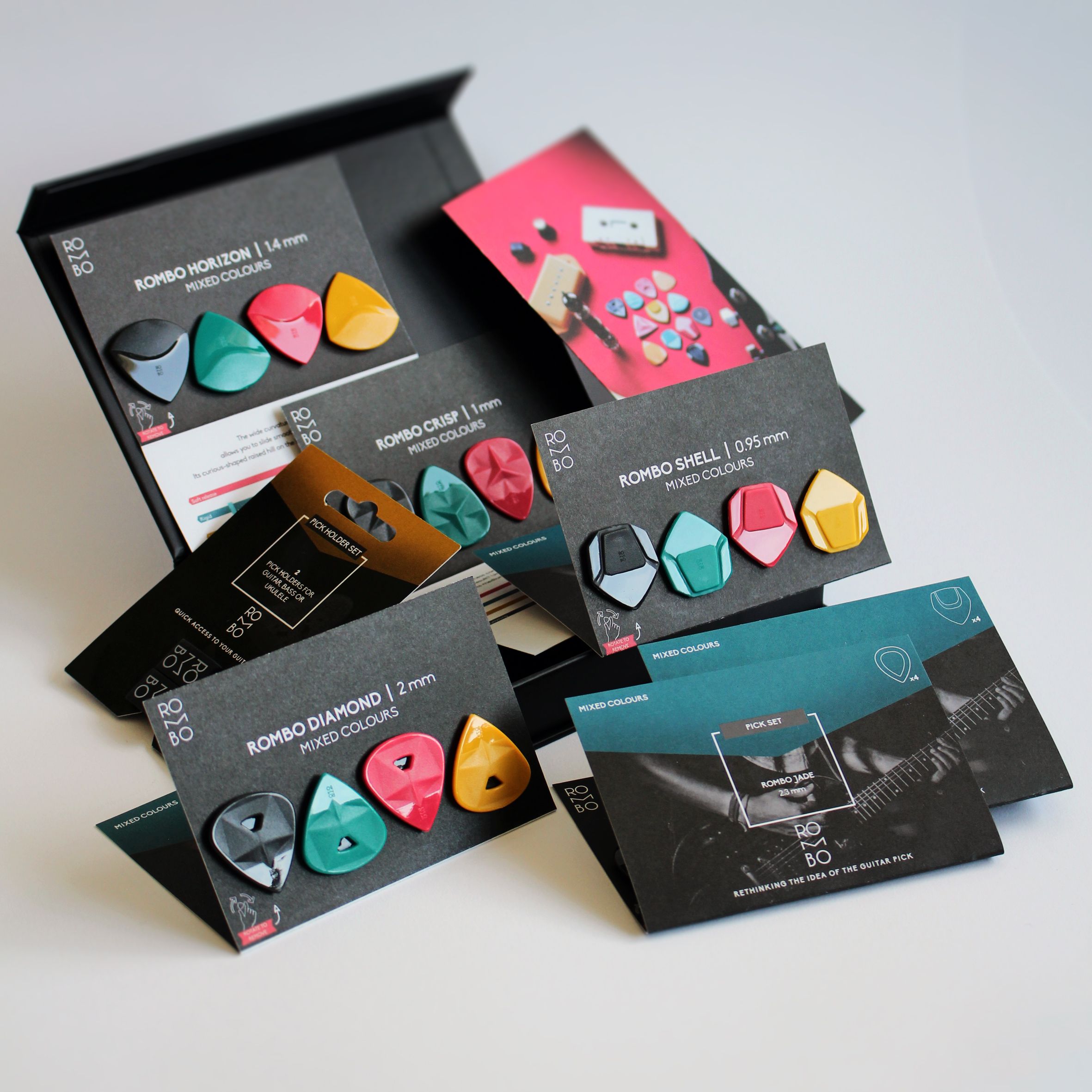 Vibrant guitar picks displayed in packaged sets, ideal for musicians seeking mixed colors.
