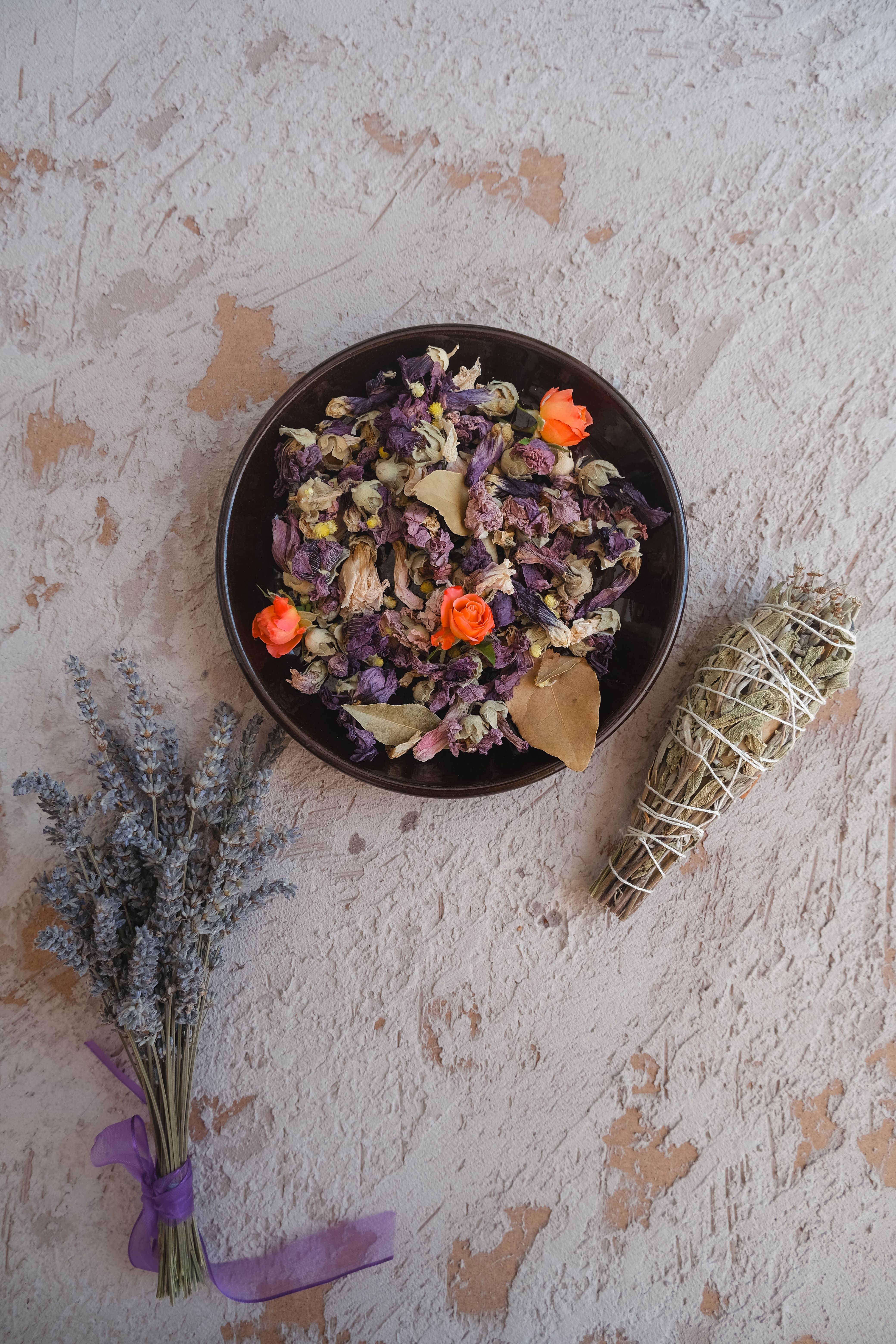 Aesthetic arrangement of dried flowers and herbs for a calming setting.