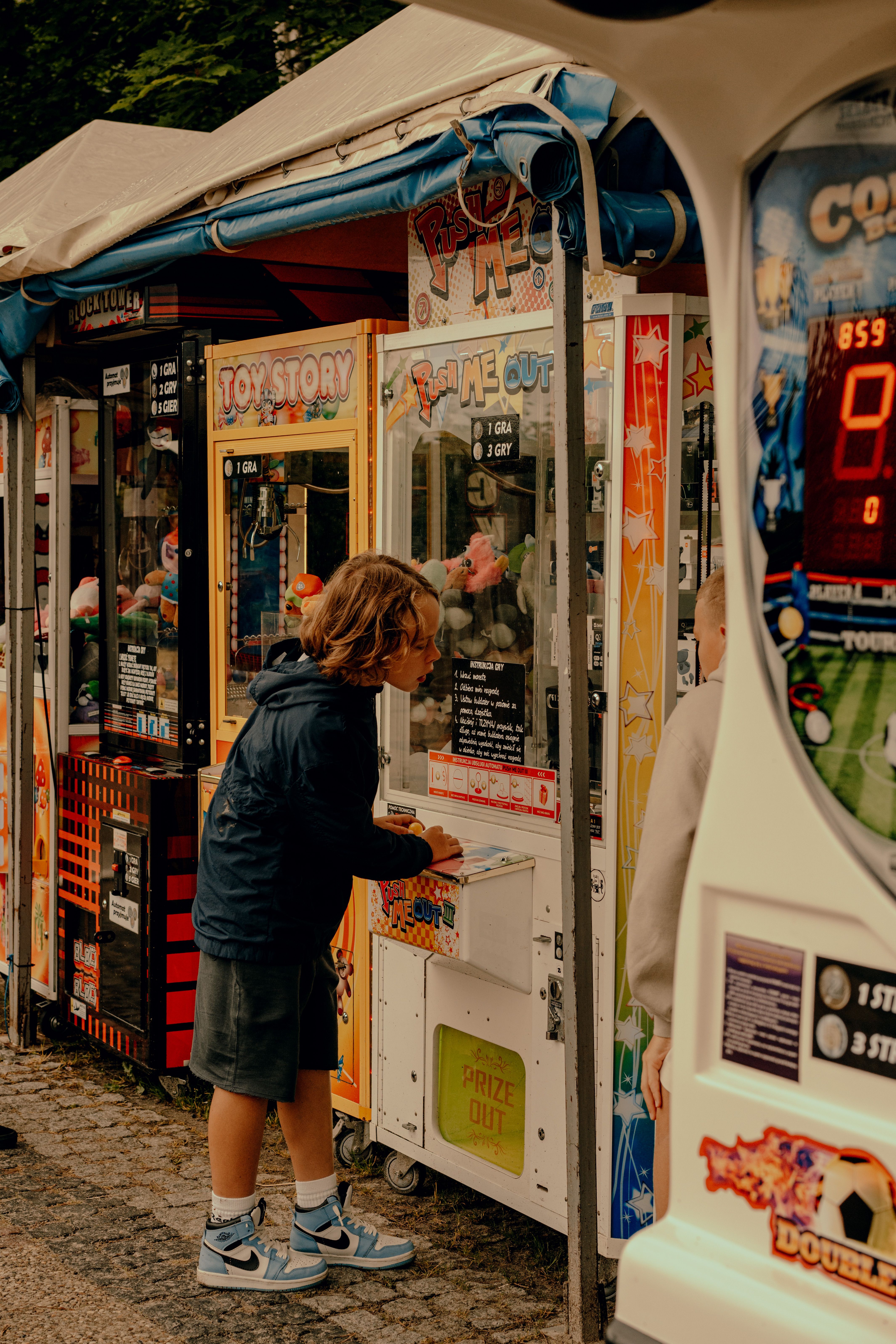 Little Boy in Front of a Machines · Free Stock Photo