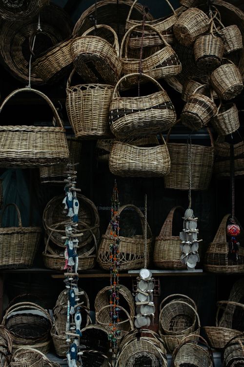 Free A variety of handmade woven baskets displayed in a traditional market setting. Stock Photo