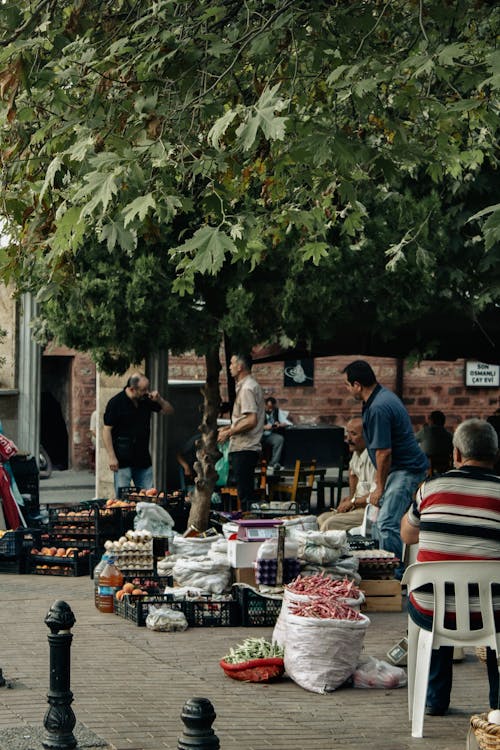 Merchants Selling Food on Sidewalk