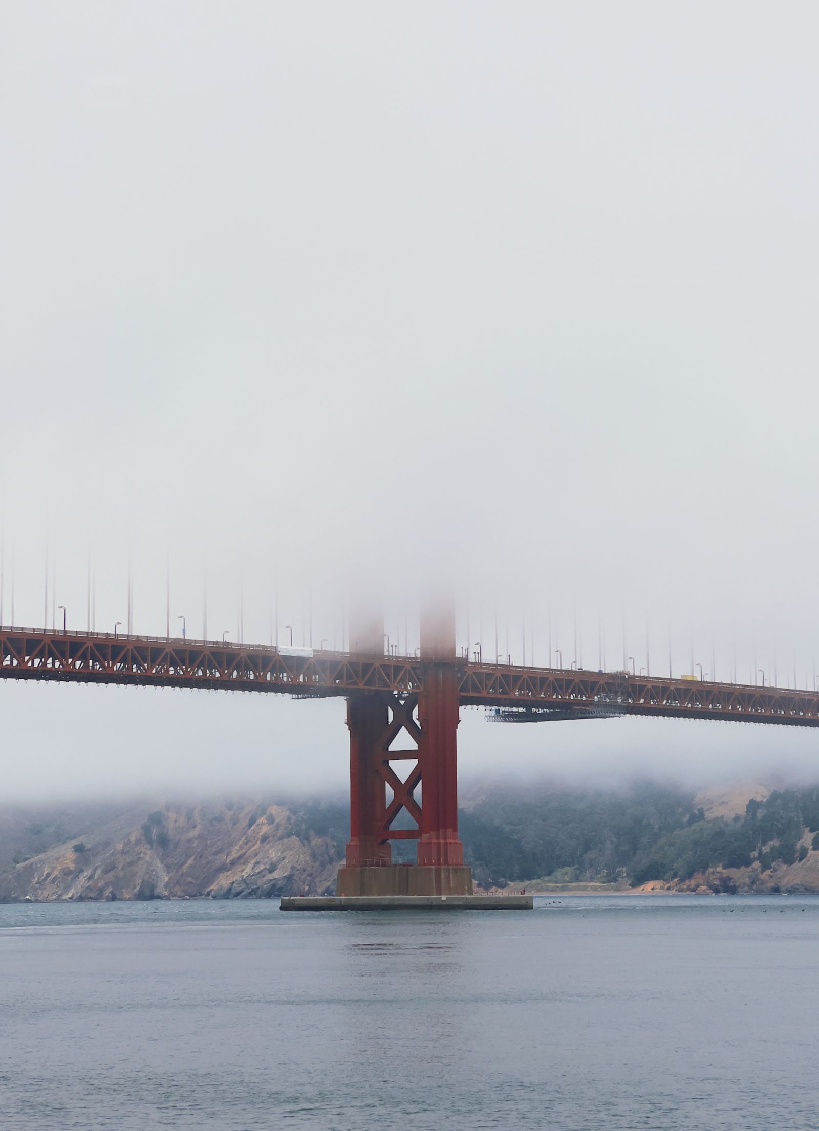 Golden Gate Bridge in Dense Fog Over San Francisco Bay · Free Stock Photo