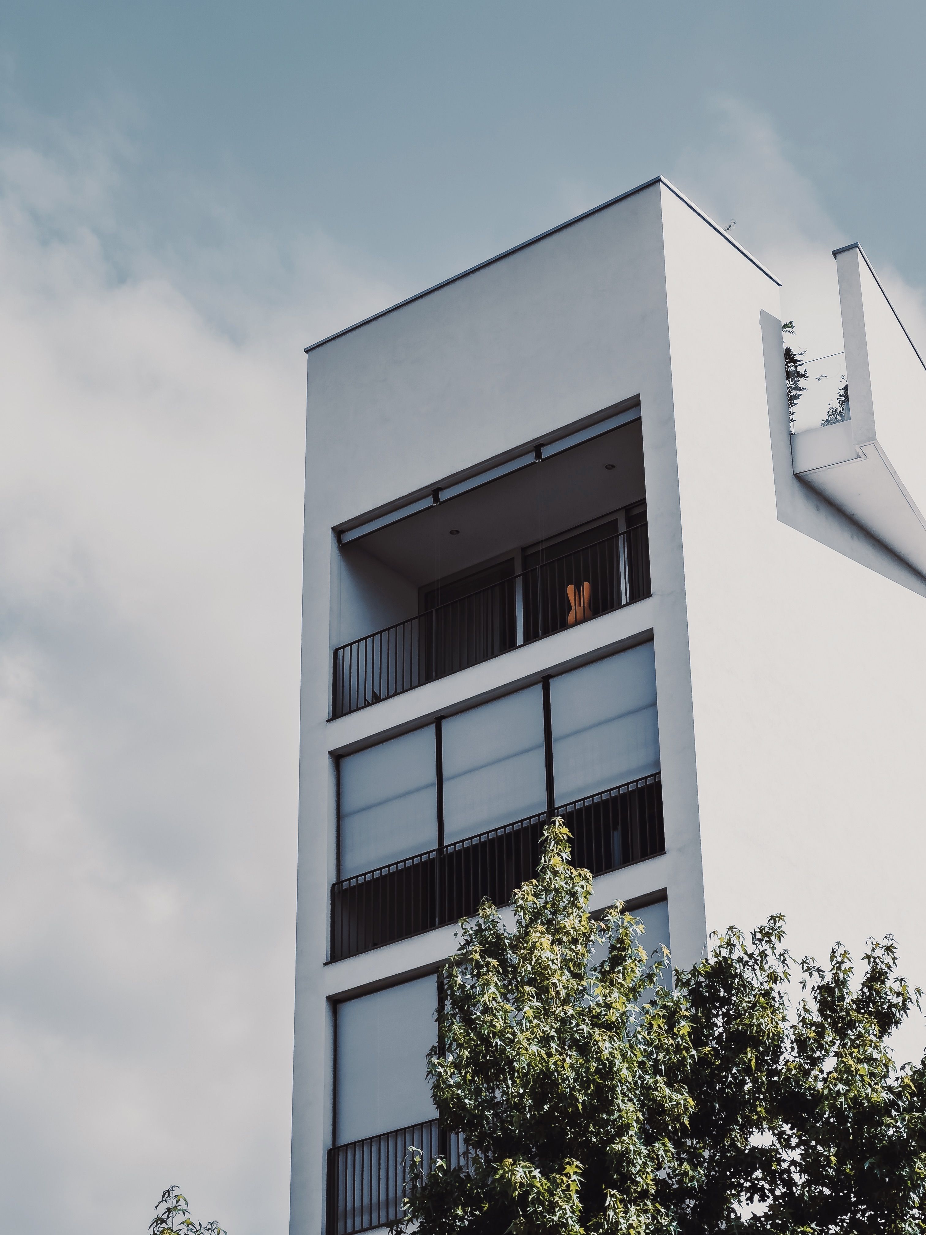 Facade of a Modern Apartment Building with Balconies · Free Stock Photo