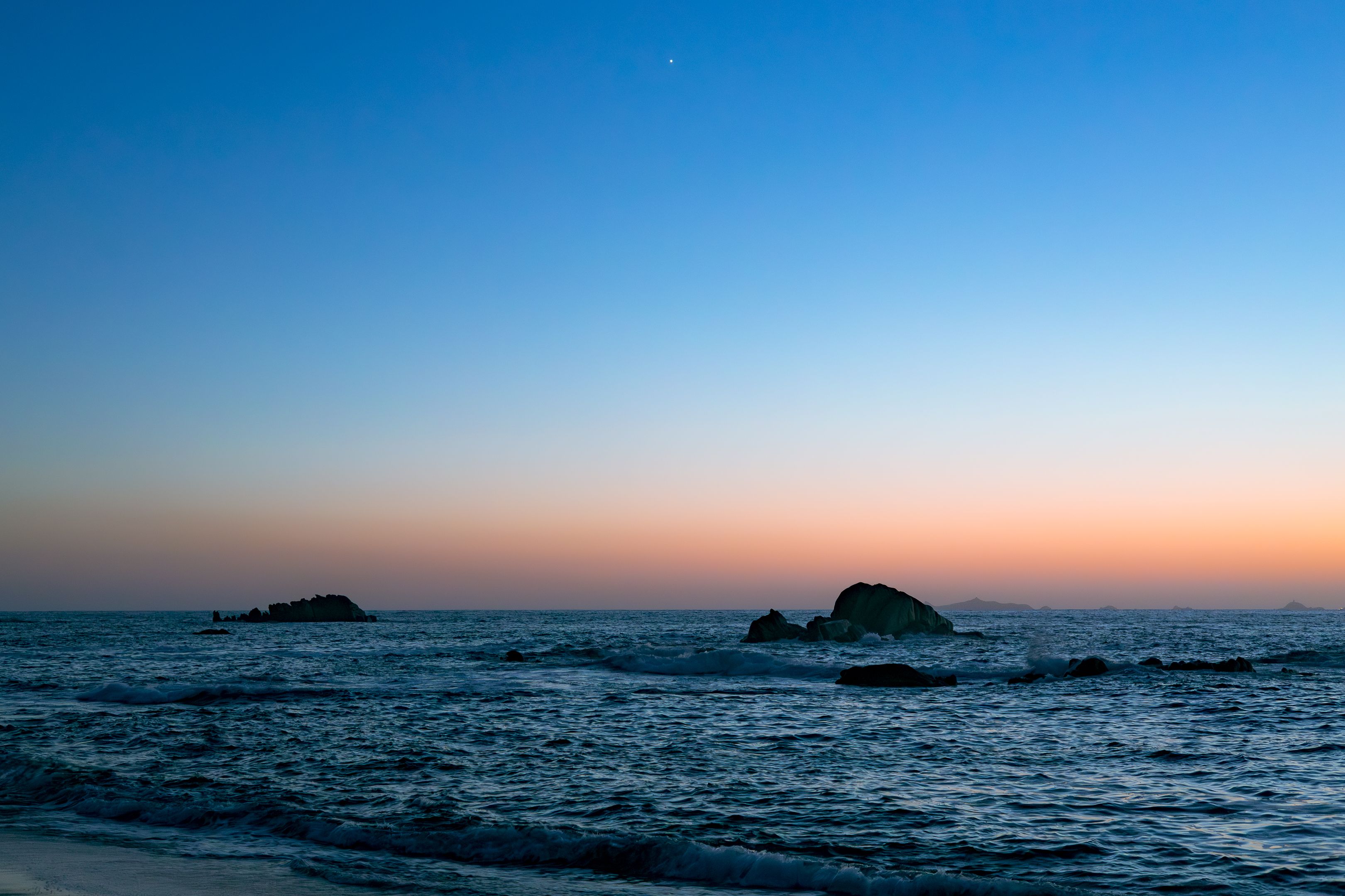 Clear Sky over Sea Coast at Sunset · Free Stock Photo