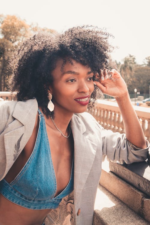 Model in Gray Blazer Over Denim Bra