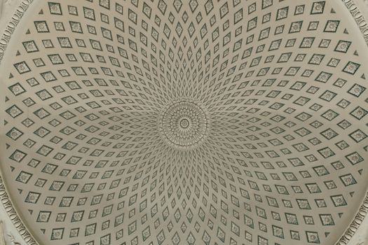 Ornate geometric dome ceiling in Saint Petersburg showcasing intricate design and symmetry.