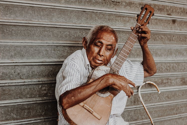 Musician Playing The Guitar