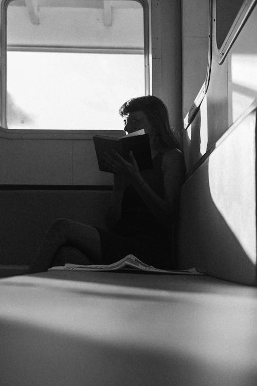 Young Woman Reading a Book