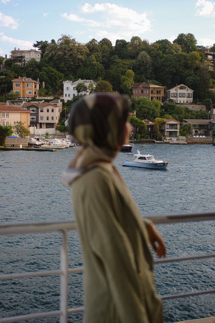 Woman Standing On A Bridge 