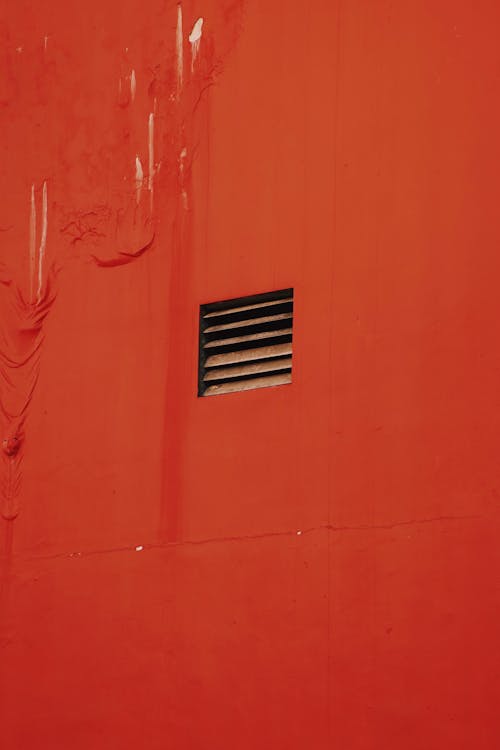 A Vent in a Red Wall 