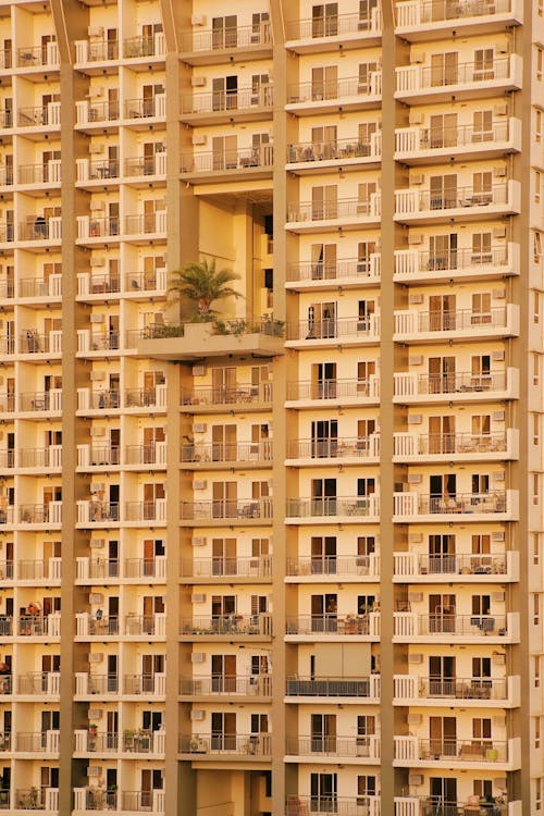Facade of a Tall Block of Flats in City 