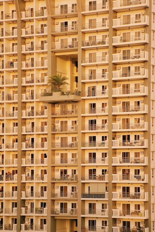 Free Facade of a Tall Block of Flats in City  Stock Photo