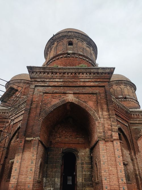 Free A close-up view of a historic brick structure with arches in Srinagar, India. Stock Photo