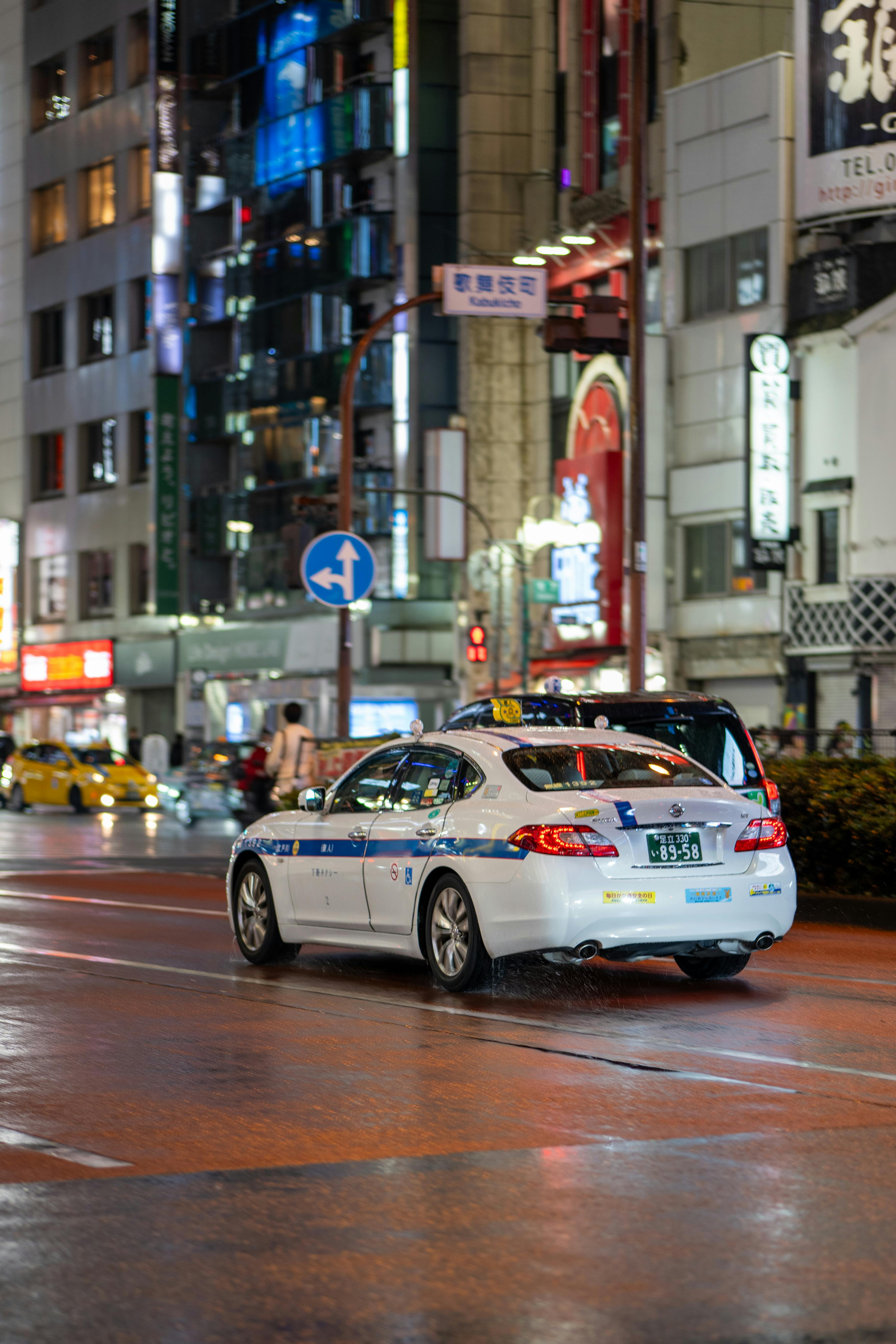 A Japanese Taxi on the Street at Night · Free Stock Photo