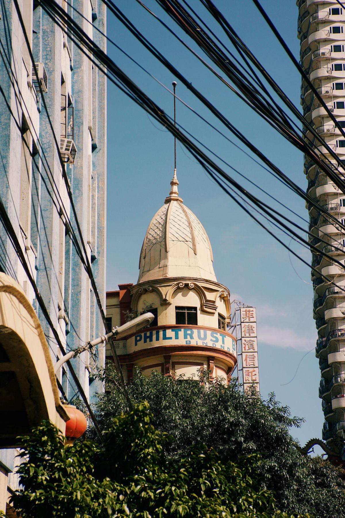 Street in Manila with Residential Buildings and Skyscrapers in ...