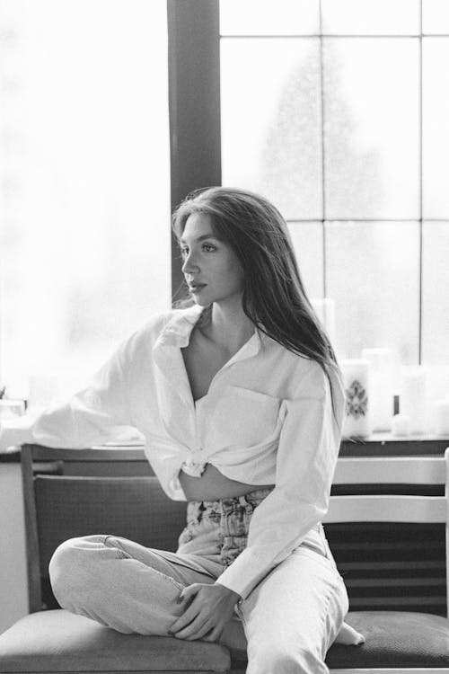 Black and White Photo of a Model in a White Shirt
