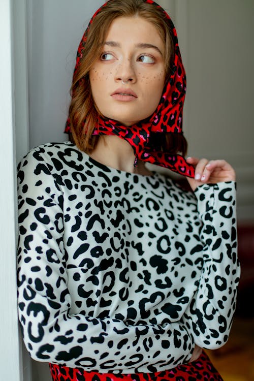 Woman Posing in Leopard Print Long Sleeve Tunic and Headscarf