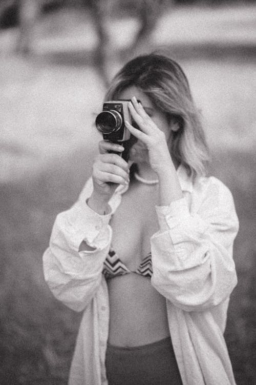 A Woman Taking a Picture with a Camera