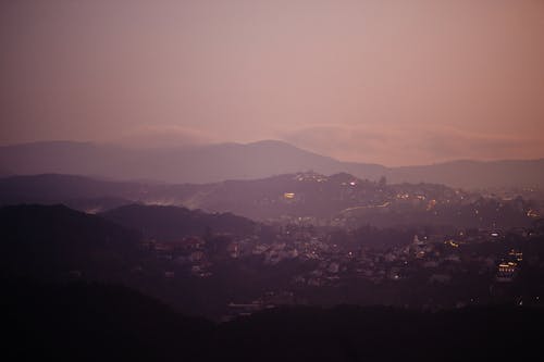 Scenic Landscape with a Hilly Town at Dusk