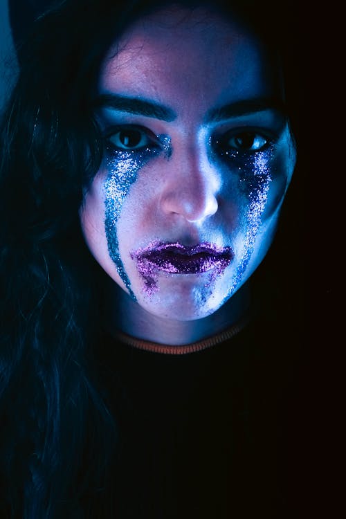 Portrait of a Young Woman with Glitter on Her Face 
