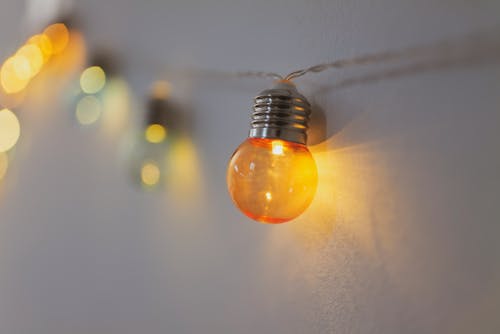 Light Bulb Hanging on Wall