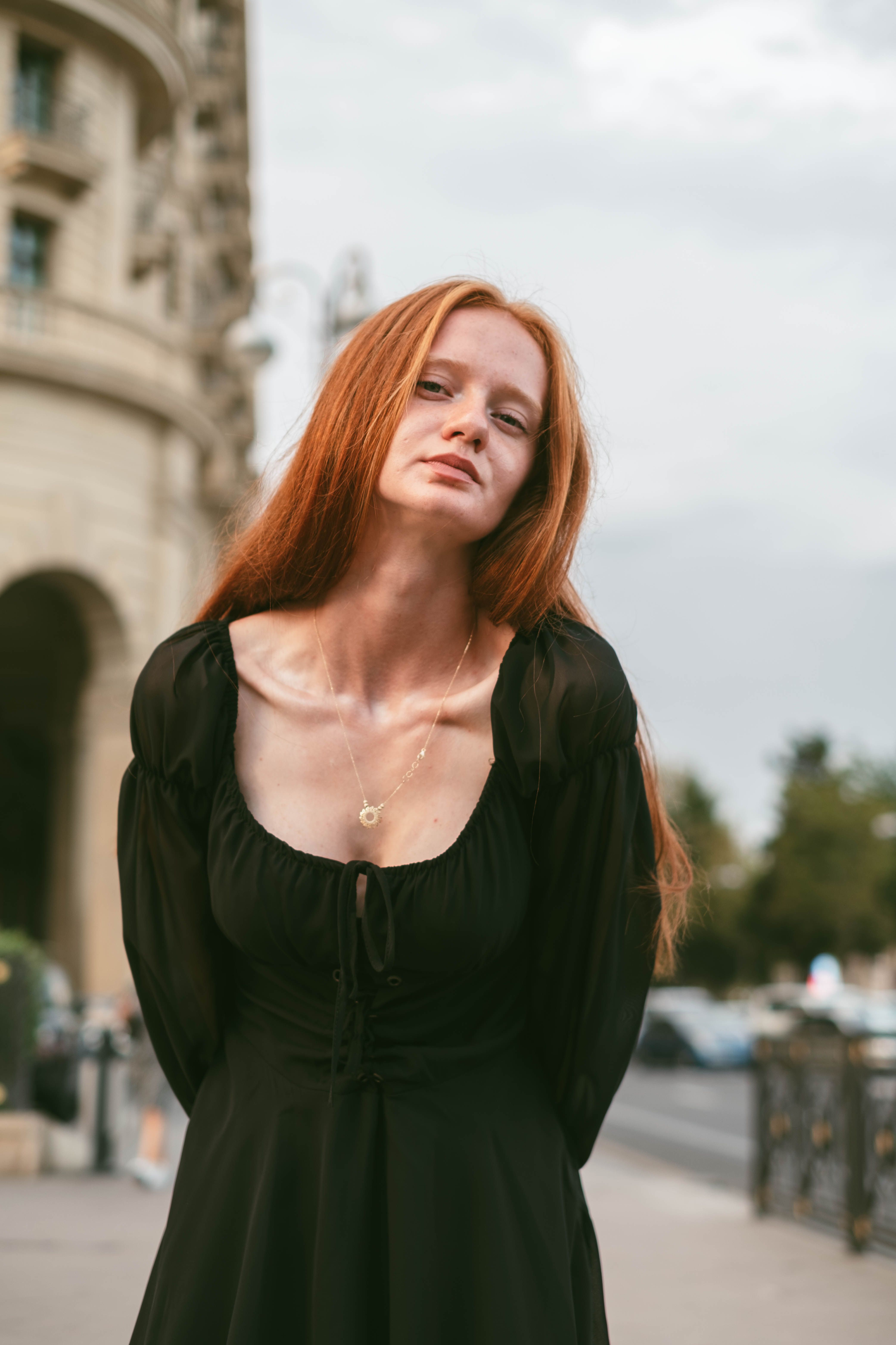 Portrait of a Woman in a Black Dress · Free Stock Photo