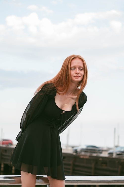 Redhead Woman in a Black Dress 
