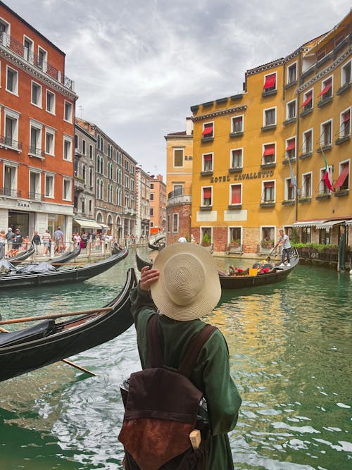 Woman in Sunhat Looks at Venice