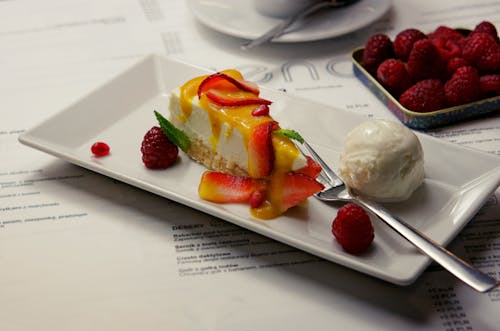 Free Cheese Cake with Strawberries and Ice Cream Stock Photo