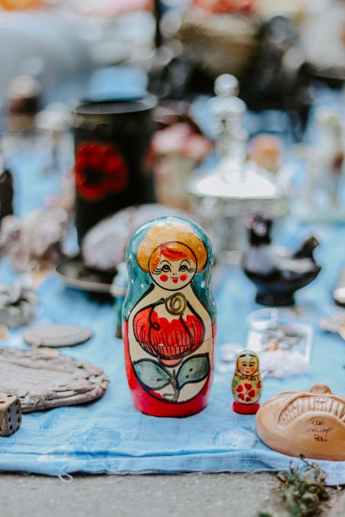 Free Close-up of colorful traditional Russian matryoshka dolls at a flea market. Stock Photo