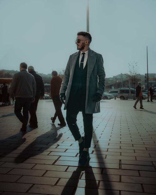 Elegant Man in Suit and Coat