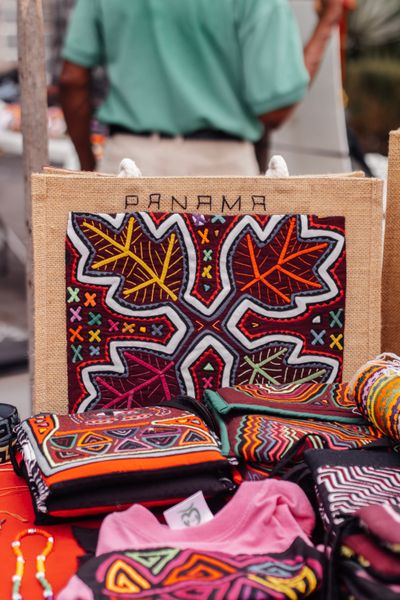 Mola reverse-appliqué textiles