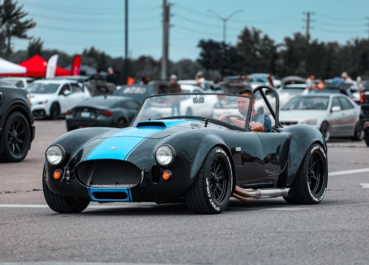 Man Driving AC Cobra