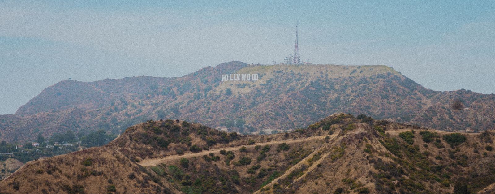 Scenic view of the Hollywood Sign atop Mount Lee in summer, USA.