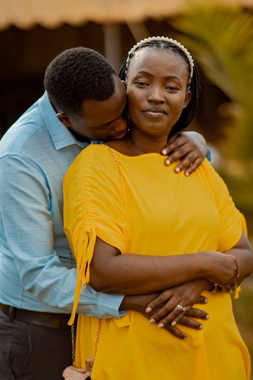 Husband Kissing His Wife on the Neck