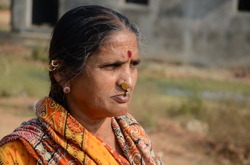 Woman Wearing Traditional Jewelry and Bindi
