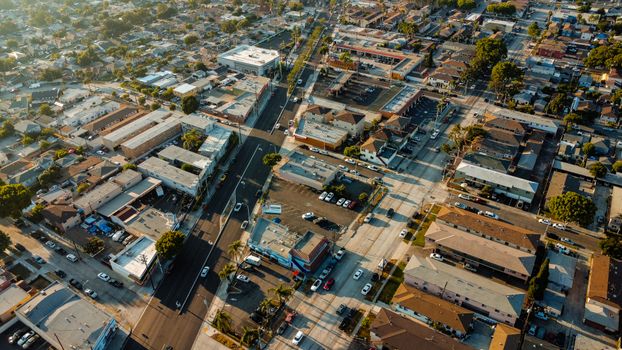Aerial view of Lynwood, CA showcasing urban landscape and streets during the day.