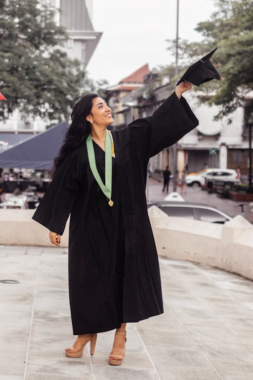 Happy Graduate Woman in Academic Dress