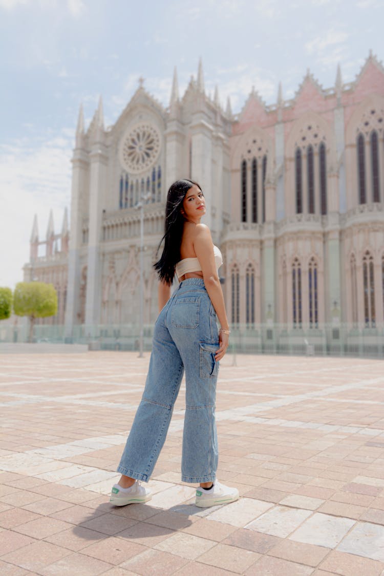 Young Woman Standing In Front Of The Templo Expiatorio In Leon, Mexico 